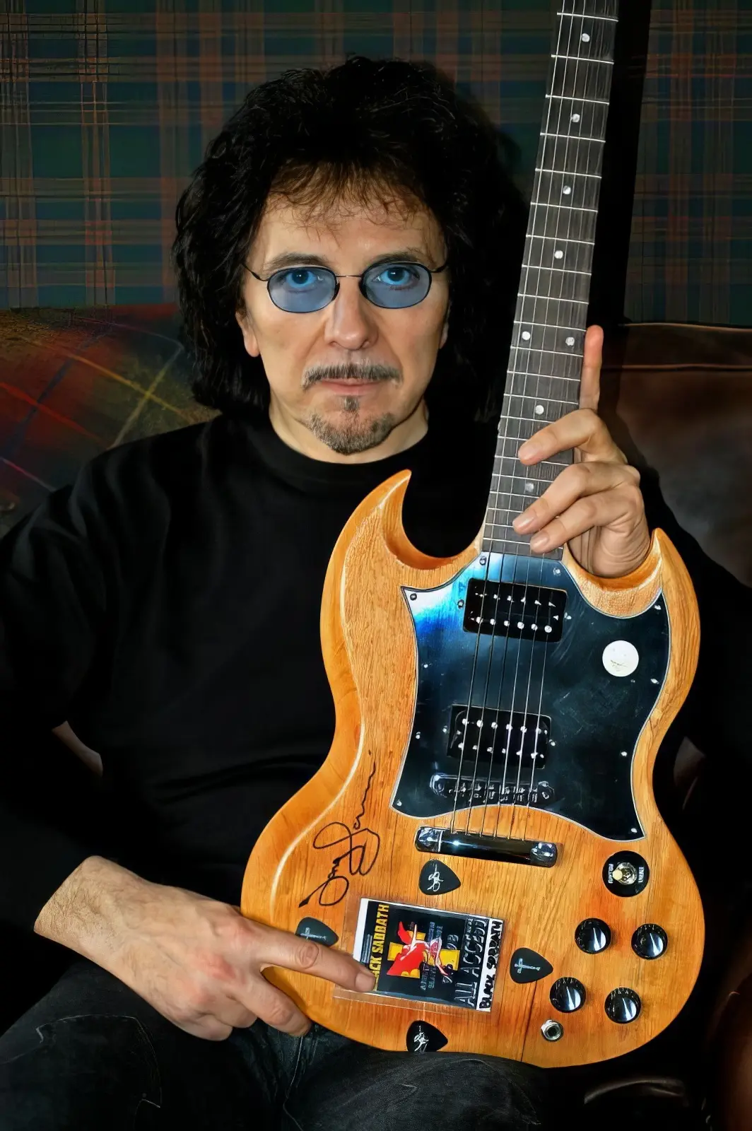 Tony Iommi with Gibson charity guitar.